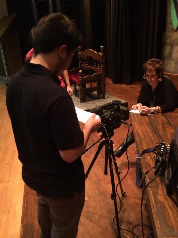 Junior Argeen Ghazarian from Clark's cinematography class gets some B-roll footage of the Director, Barbara Zatarain, to use later in background footage. Miss Zatarain has been directing plays at Wilson Middle School for the past fifteen years.  