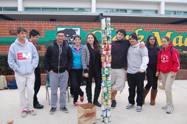Stacking canned food towers