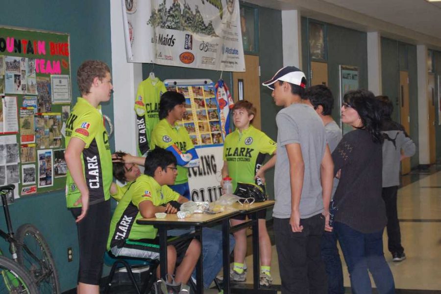 Bike club members talk about the clubs activities to prospective students.
