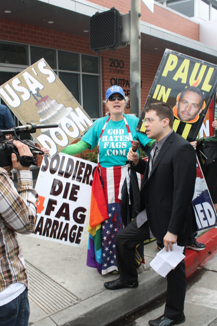  Phelps-Roper protests with anti-gay slogans.