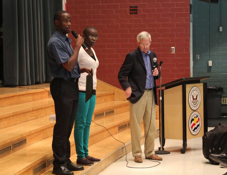 Chess coach Robert Katende, chess champion Phiona Mutesi and Sports Outreach Network President Rodney Suddith address questions from the audience. 