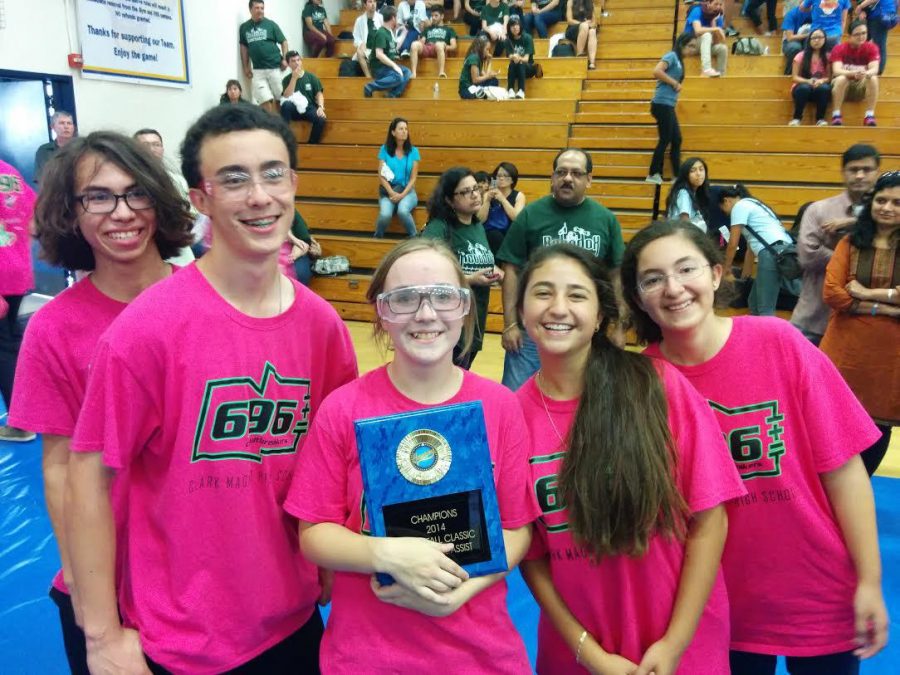 Students stand with award after winning the 2014 FIRST Burbank Fall Classic.
