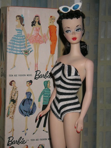  Barbie dolls setting a bad example making young girls feel insecure.