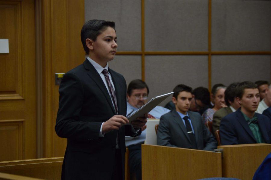 Anthony Karroum presenting during the competition. He played the role of the Pretrail Lawyer, and argued a small piece of the main case. Ultimately he won his debate.

