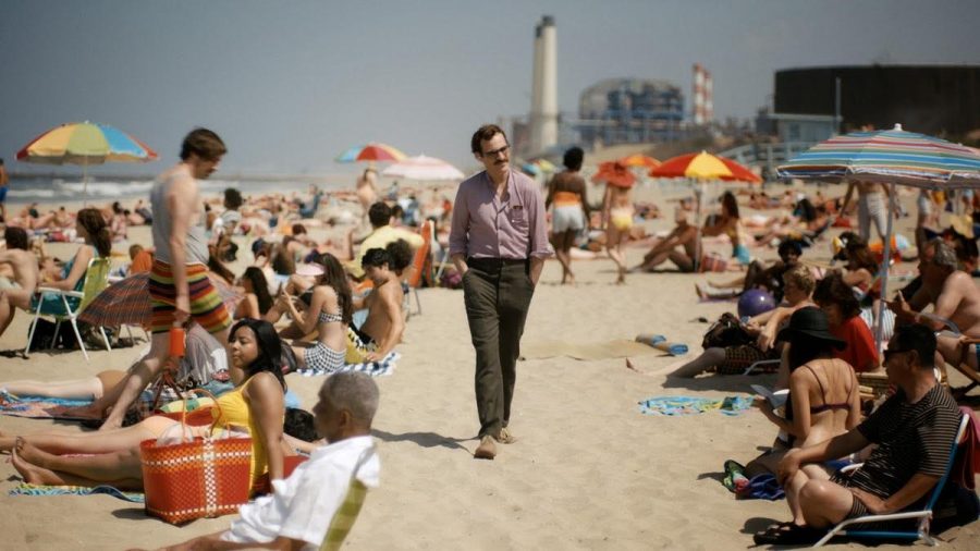 Joaquin Phoenix takes a lovely stroll on the beach accompanied by his OS in Her.