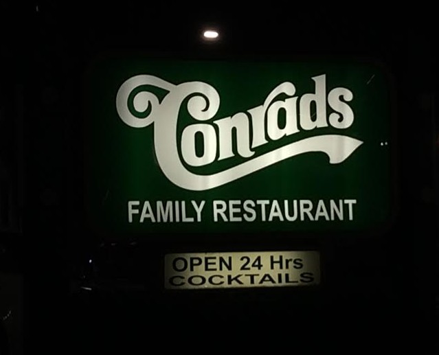 The official logo of Conrads restaurant. Conrads is a family restaurant, open 24/7, seven days a week. 
