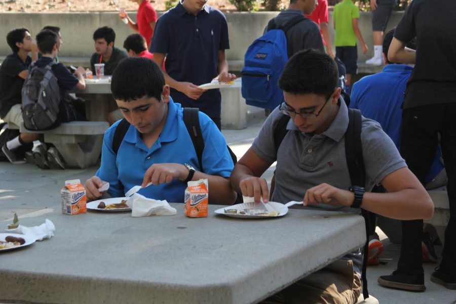 Students eating lunch on campus. Students are not allowed to leave campus for lunch.
