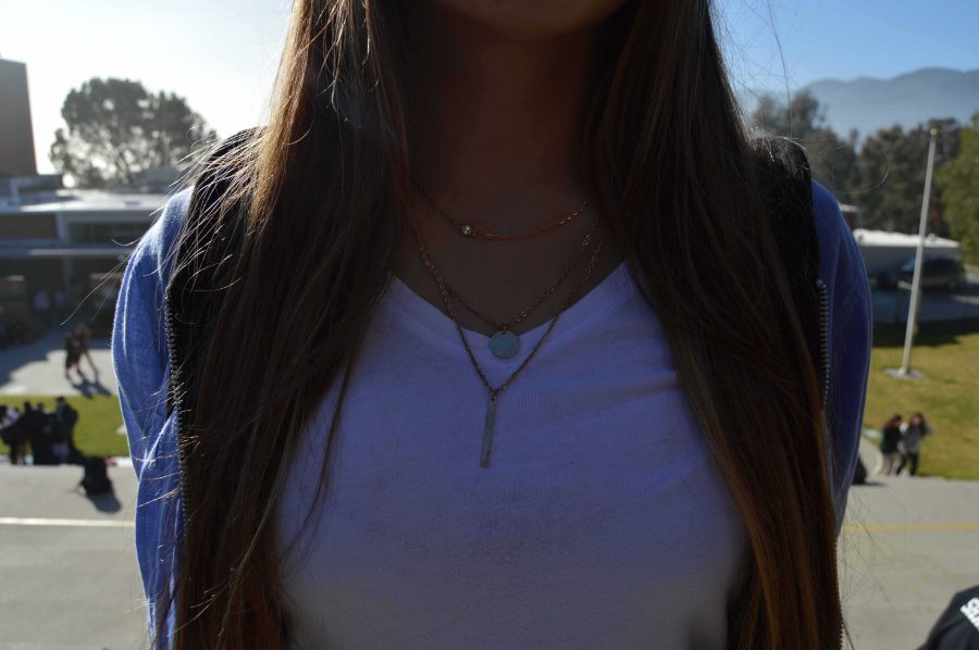 Michelle Boodaghian, junior, rocks a pre-attached three layer gold necklace that completes her outfit perfectly. “I like that it’s already connected so it looks like I tried really hard when I really just put one necklace on,” Boodaghian said. “Plus it finishes off my outfit really well.”  
