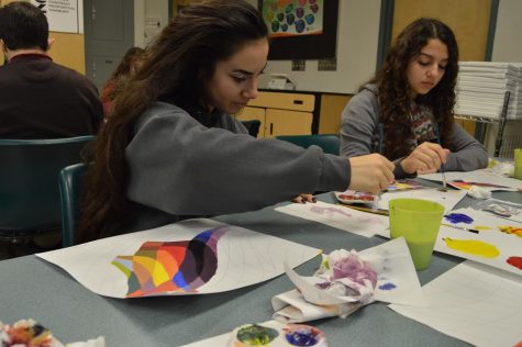 Art student sophomore Marida Torosyan works on an assignment with water color.  