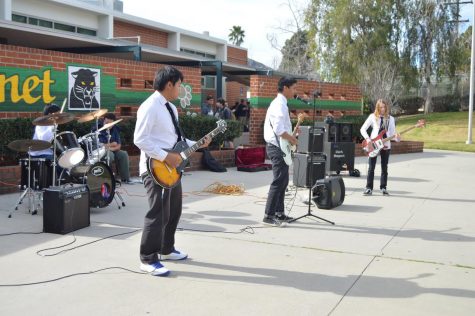 1/10 performs at the Winter Formal Rally at lunch. 
