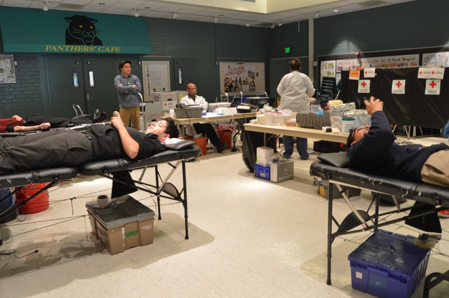 Clark Magnet students donating blood in the auditeria. 