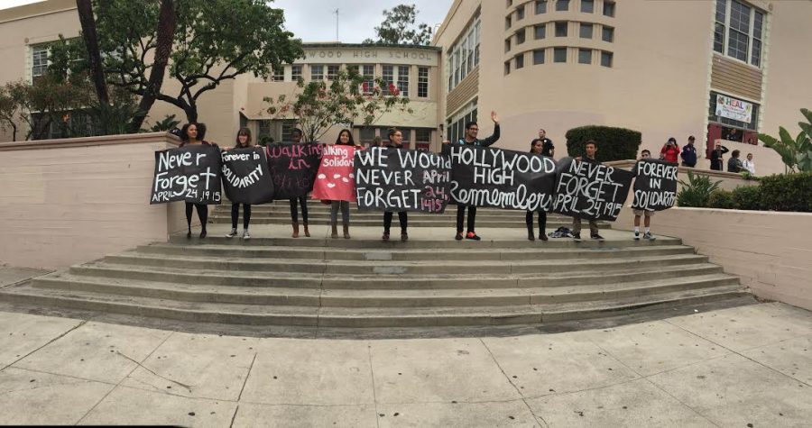 Students at Hollywood High School stand outside their high school with posters in commemoration of the Armenian Genocide.
