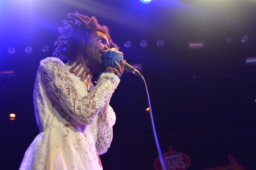 By far, the creepiest performer singing awfully in a bloody wedding dress at the Warped Tour 2015 Kickoff Party. 
