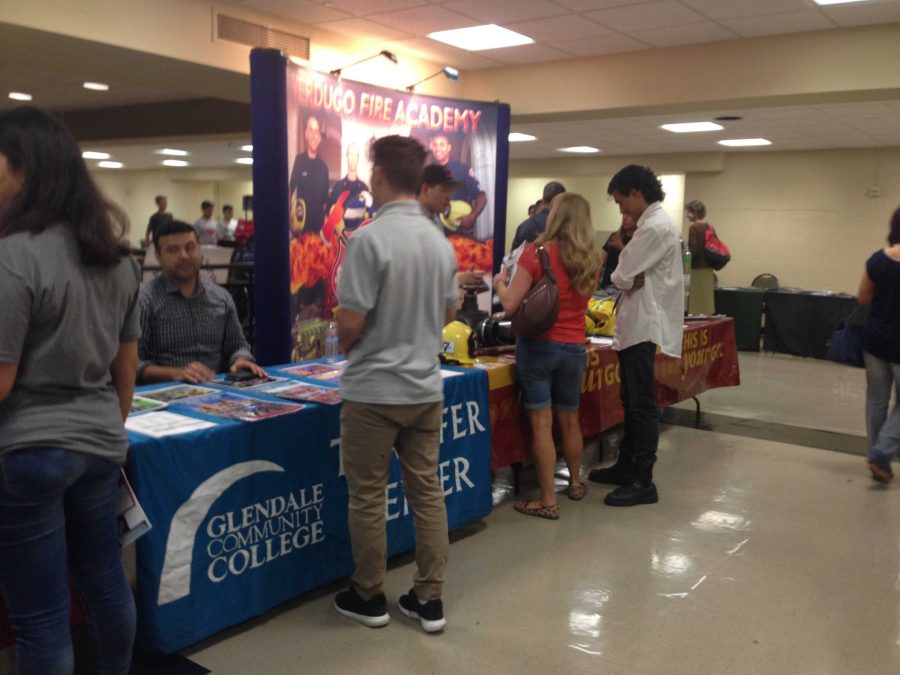 Attending a college career fair is a great way to ask alumni questions about colleges and universities.
