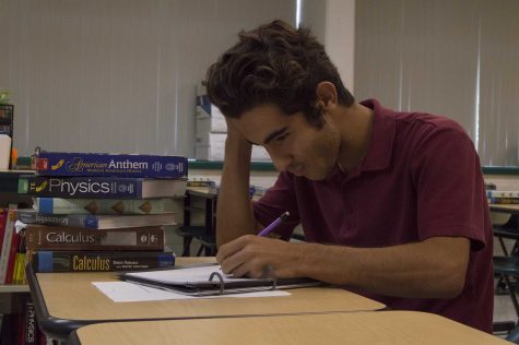 Areen Andreasian strives to complete his math work.