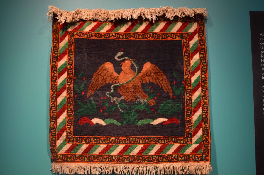 Persian-style woven carpet with Mexican eagle.