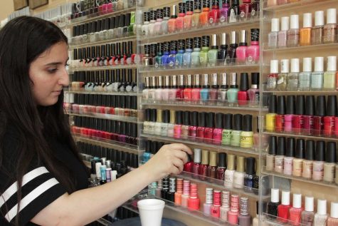 Me organizing the nail polish bottles back into place after they was used.