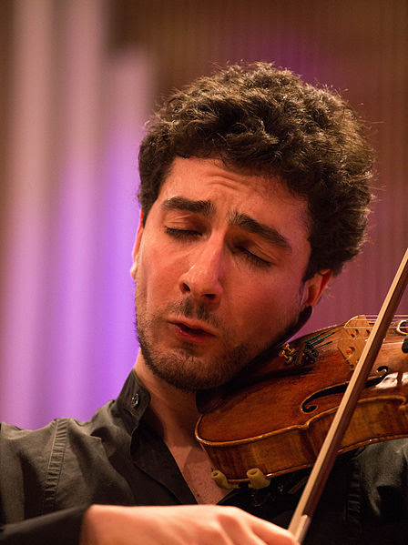  Sergey Khachatryan plays the violin at a concert.