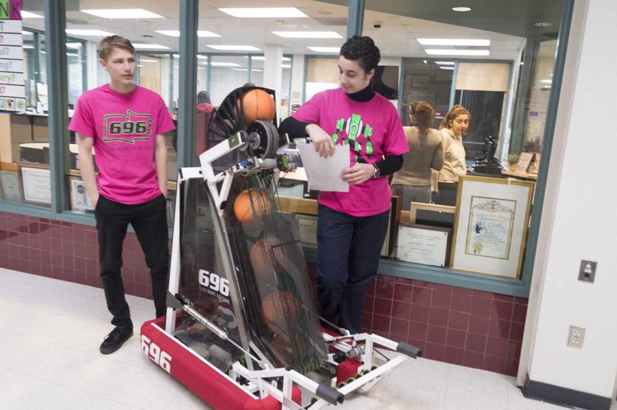 Eden Morris and Bagrat Mikhaelyan show off their unique robot