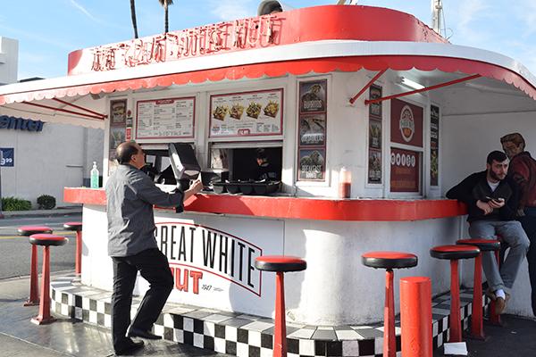 The glorious and proud Great White Hut standing strong on the intersection of Orange and California.