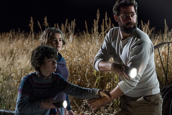 Lee reunites with his kids in the farms wheat field. 