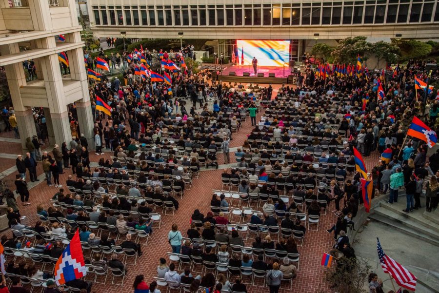People gather at City Hall on April 23 to commemorate the Armenian Genocide.
