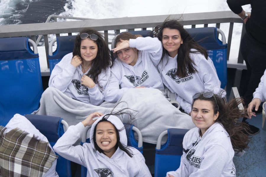 Seniors bundle up together  with blankets and our senior sweatshirts.