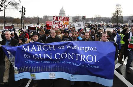 Protesters march to protest the recent spike in gun murders in America in Washington D.C..