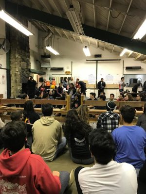 Dr. Roberson spending time with the AYF camp members during one of their off-campus trips.
