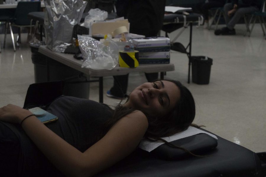 Student+waits+to+get+her+blood+drawn+by+a+Red+Cross+volunteer.