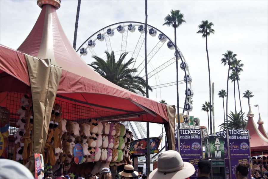 The enormous Ferris wheel and game booths decorated the fairgrounds 