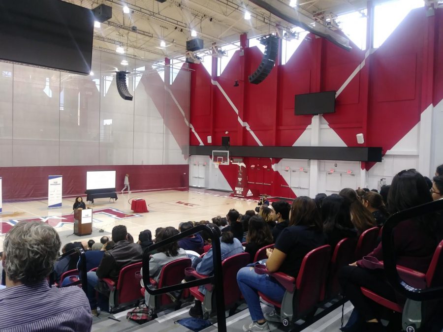 People listen to Anahi Godinezs introduction to College Prep Saturday.