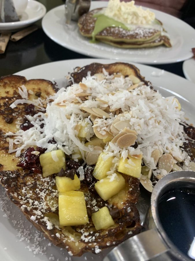 The Hawaii Five-O French Toast has coconut, pineapple, almond, dried cranberries, and chocolate chips.