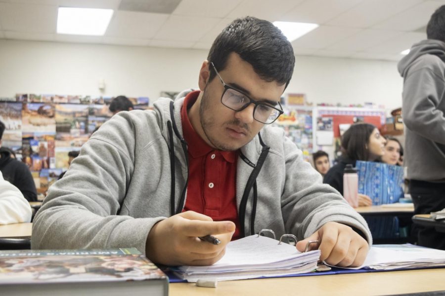 Senior Ruben Erkanian studies for his AP Government and Politics exam last year. 