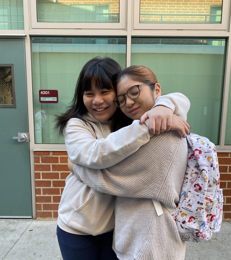 Juniors Tyra Quiachon and Jannice Rigor hug each other as a way to spread kindness around Clark. 