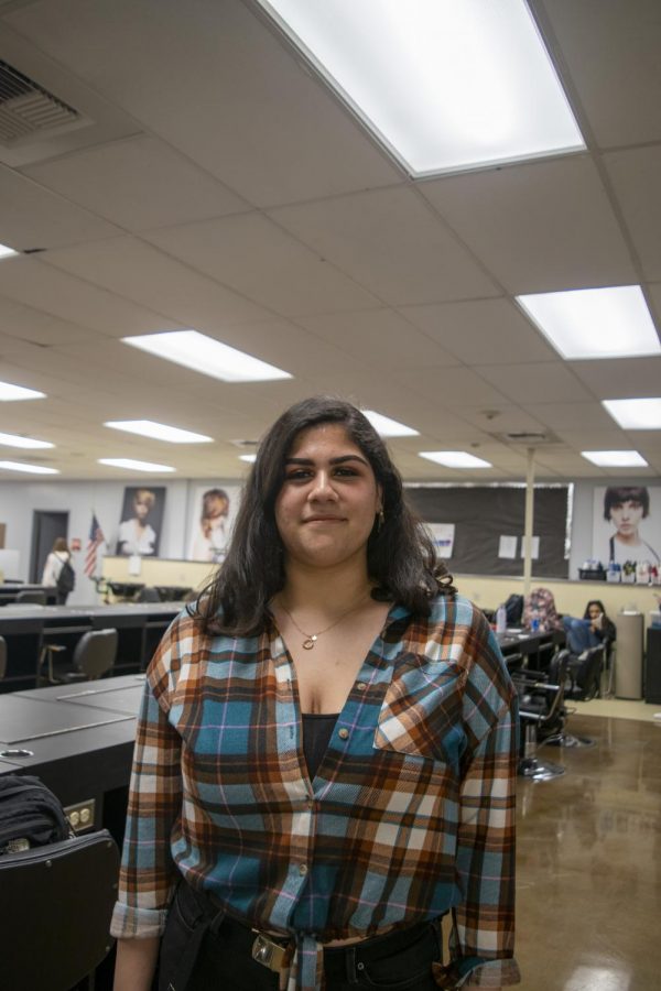 Glendale High School (GHS) cosmetology student Natlie Perez stands in the GHS salon. 