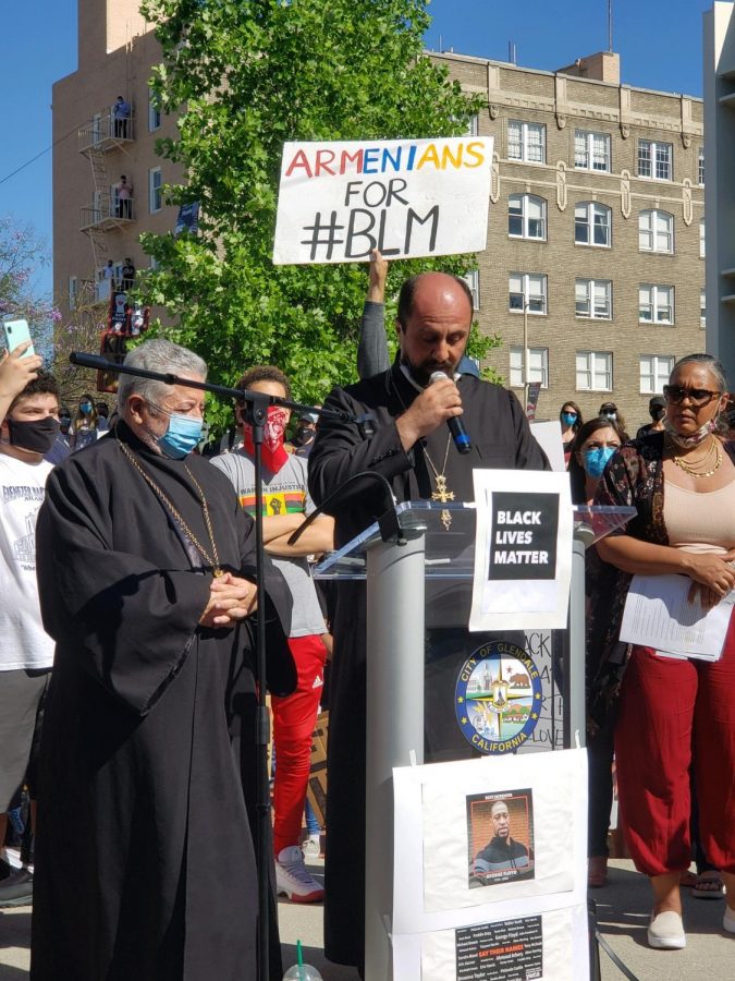 Local community leaders speak out in support of the protestors and against racism during the candle light vigil held in Floyd’s honor on Sunday, June 7.