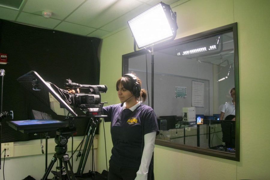 2020-graduated senior Lyanna Babakhanian handles the cameras and audio to help the Broadcast Club.