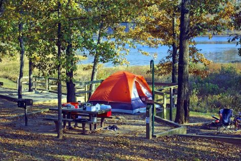 Tent camping allows visitors to enjoy the outdoors next to lakes in California national parks. 
