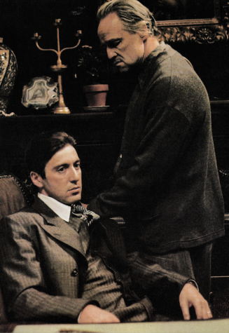 Al Pacino as Michael Corleone, and Marlon Brando as Don Vito Corleone in Mario Puzos The Godfather.