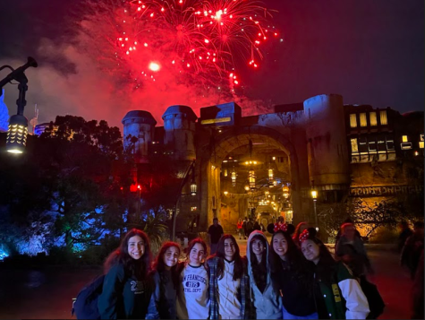 Seniors (left to right) LIlia Hacoupian, Vanya Arakelian, Mariangel Kourkounian, Melineh Shaverdyan, Anahit Sukiasyan, Elen Grigoryan and Nairy Manoukian pose during fireworks at Galaxys Edge.