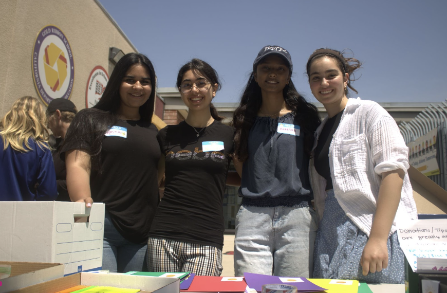 Golden Book project leaders Amna Fadel, Nicole Tokatlian, Raeesah Alam, and Sarin Khatcherian host their last book fair at Horace Mann Elementary School on April 22, 2023.