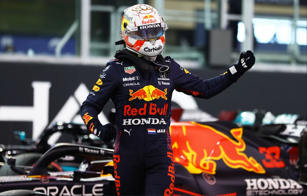 Max+Verstappen+after+claiming+his+first+world+title+in+Abu+Dhabi+2021.%0A