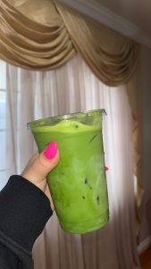 A matcha latte prepared using real and ceremonial matcha powder, which leaves a dark green color.