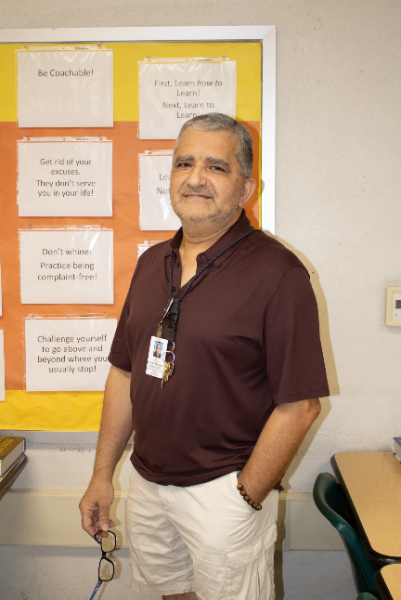 A portrait of Mr. Ghavam in his classroom.